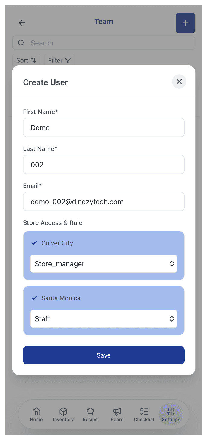 Create User modal showing First Name, Last Name, Email, and per-store Store Access & Role assignment